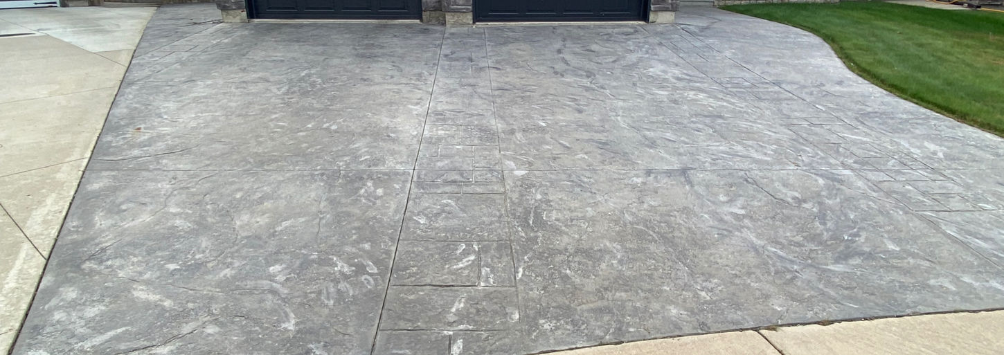 Stamped concrete sealed to restore appearance and extend lifespan