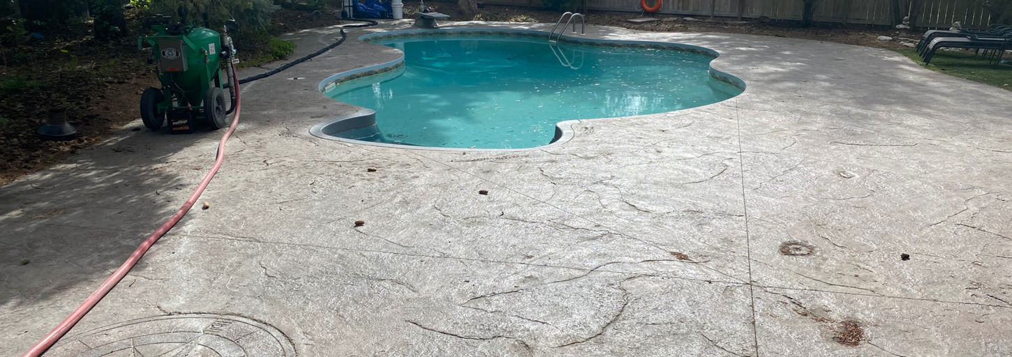Stamped concrete glow up after professional cleaning and sealing