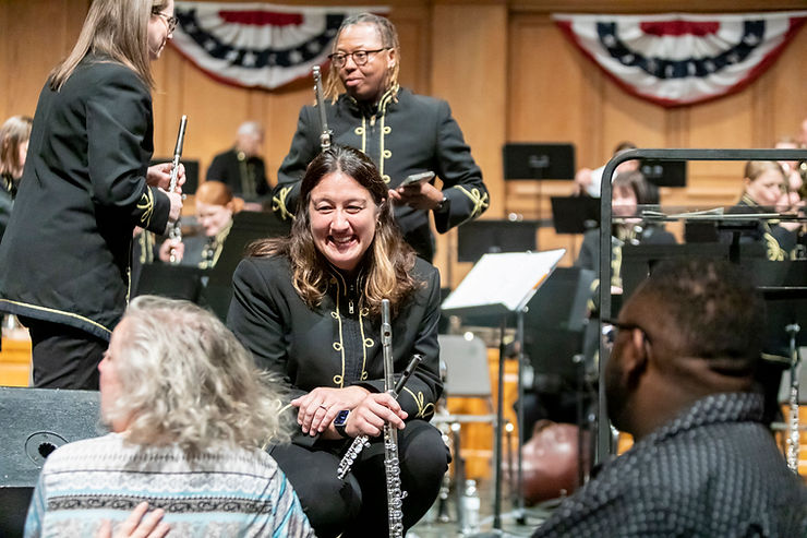 Emily McNeil shares a smile with audience members at 'Sousa!' on April 22, 2023.