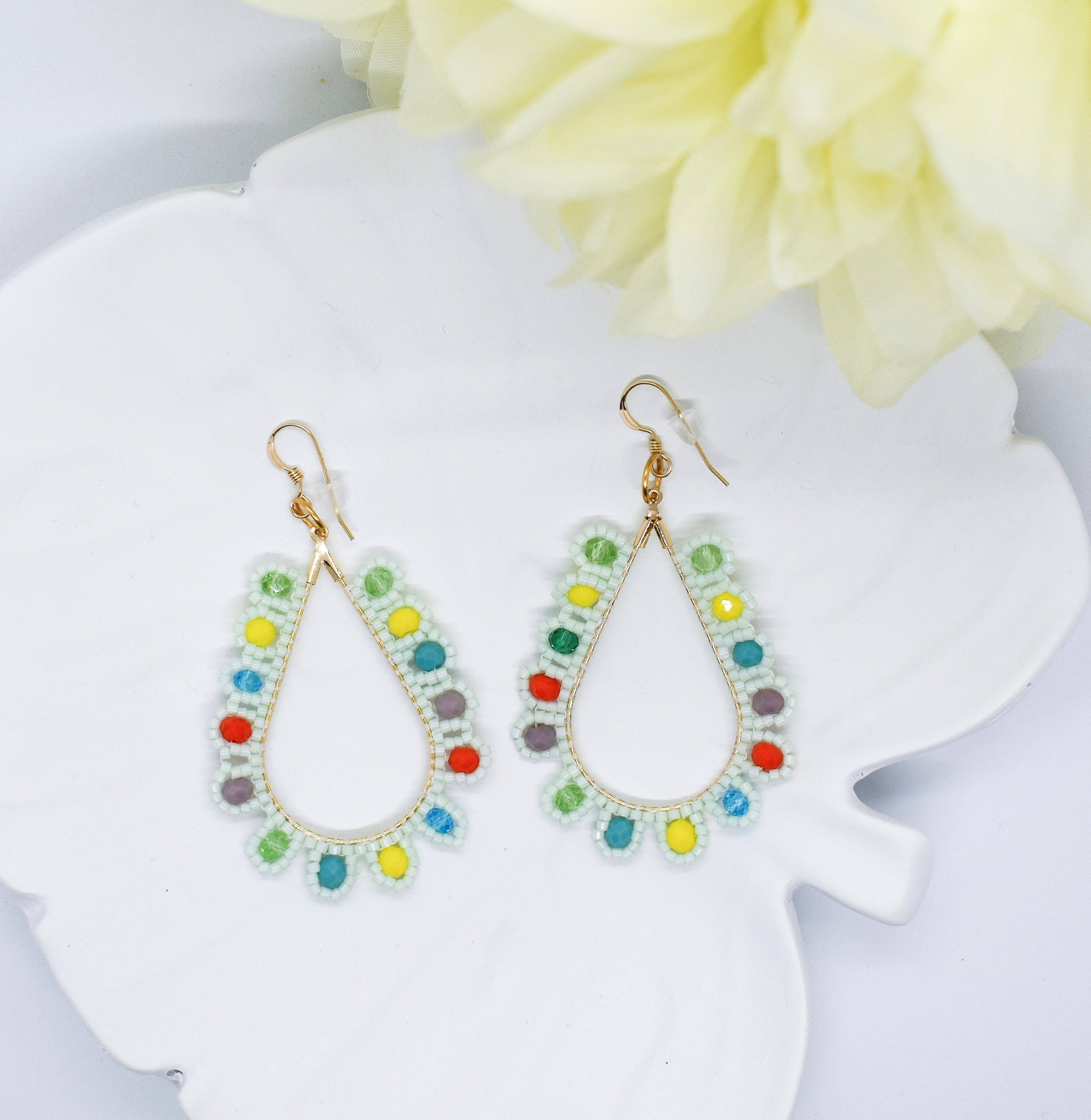 colorful earrings on a tray