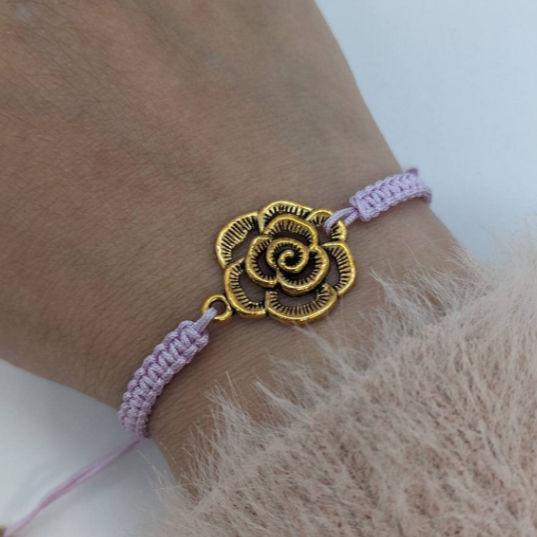 Thumbnail: purple macrame bracelet with a rose charm