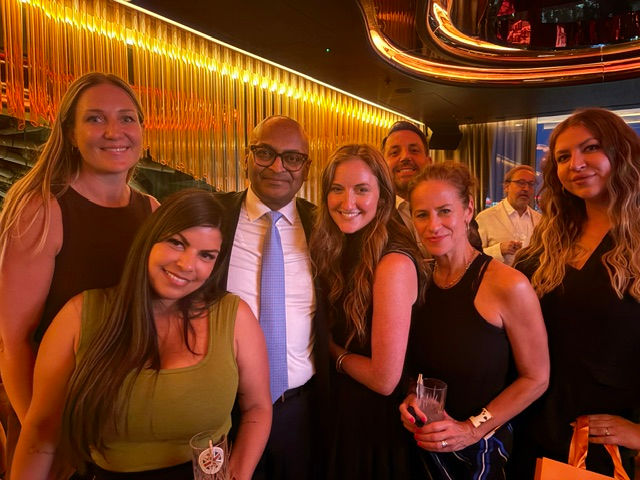 Society President Binoy Nair (centre) with some of those who enjoyed the after-meeting mingling