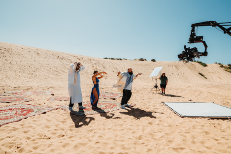 Bruce Melan directing Angel Baranes behind the scenes of a pop music video shoot. shot on Arri Alexa, in the desert,