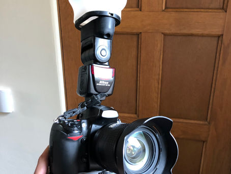 Camera with on-camera TTL flash demonstrating automated flash exposure control.