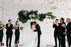 Fresh floral wedding ceremony arch