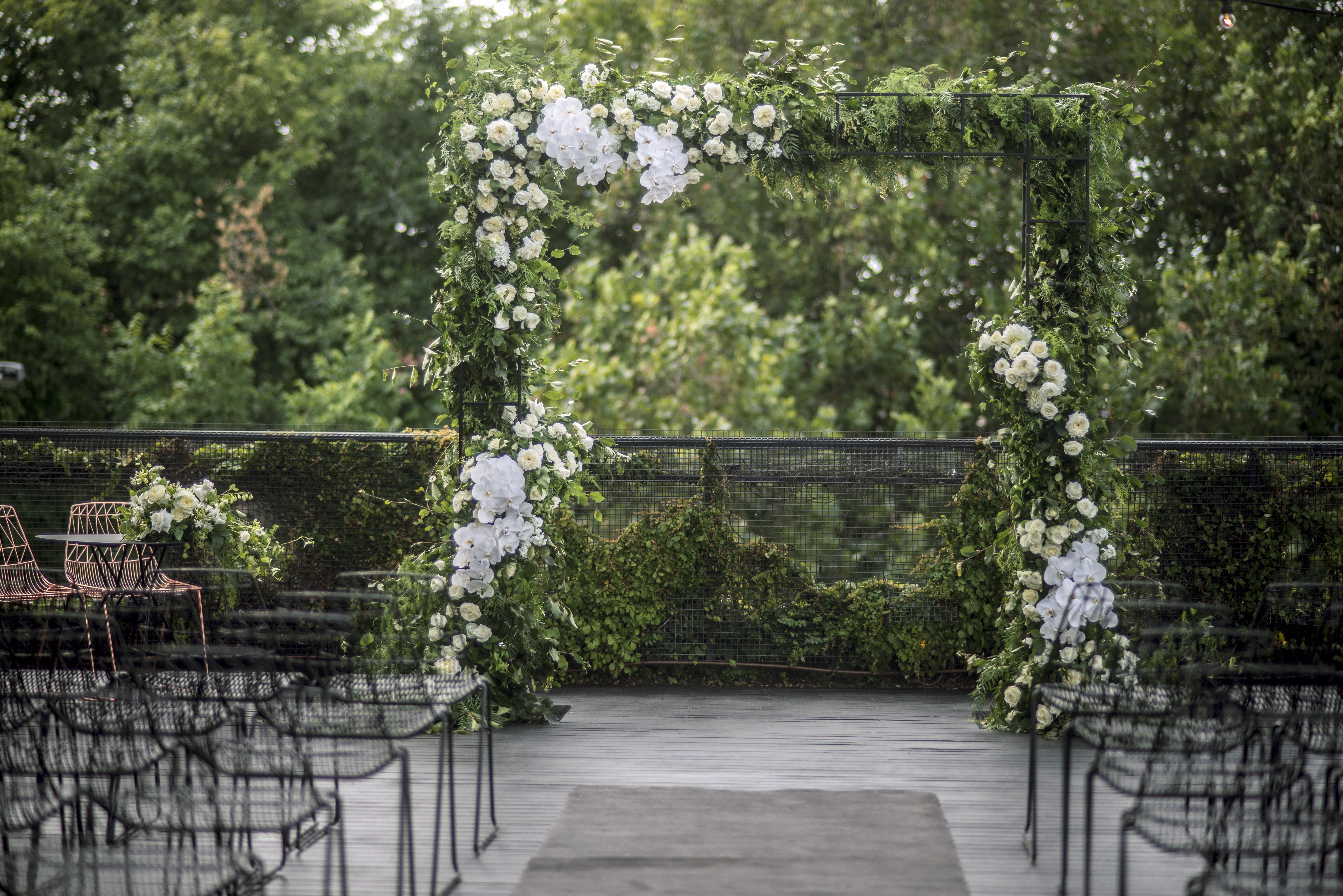 Ceremony arch fresh floral & foliage backdrops