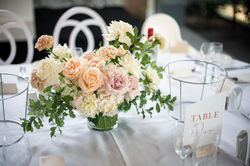 Apricot pink & cream guest tables