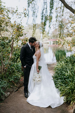 Fresh white reflexed rose wedding bouquet