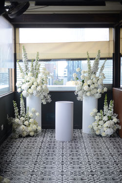 Fresh white & cream ceremony backdrop