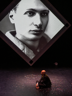 Archival portrait projected during ARTOM theatre performance