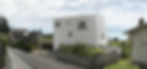 Verputzte Lochfassade zur Strasse