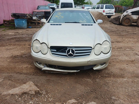 Older used 2003 Mercedes SL500 coupe with minor bumper damage.