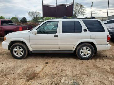 Older used 2001 Nissan Pathfinder SUV in moderate condition.