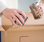 Packing Cans Community-Food-Bank
