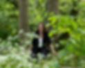 Katie Costello sitting on a fence