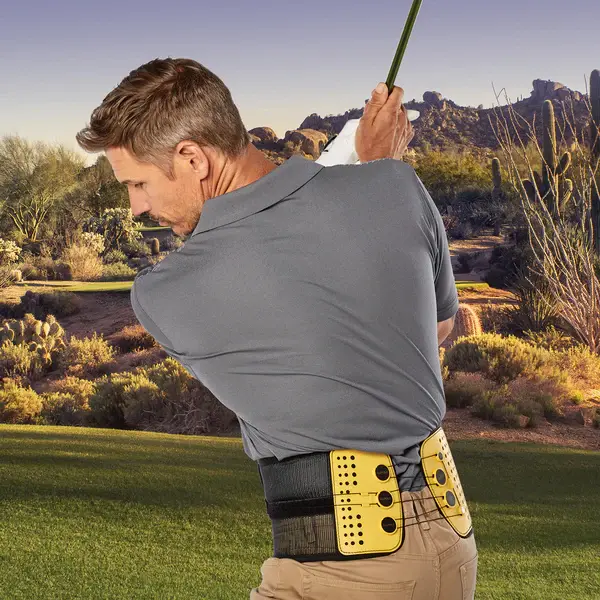 Eye-level view of a person wearing a flexible back brace while gardening outdoors
