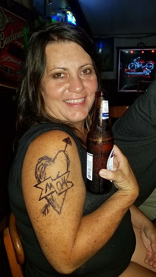 My sister's brother gave her a mom tattoo