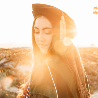 College senior photos on the beach in San Diego at sunset