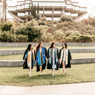 University of California San Diego graduation portraits with friends smiling together on campus
