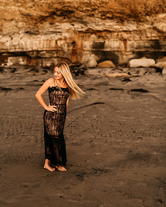 Senior season shoots at the beach with young women.