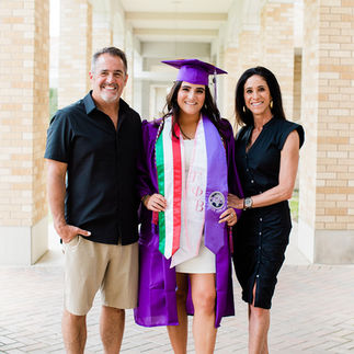 TCU grad with parents on campus