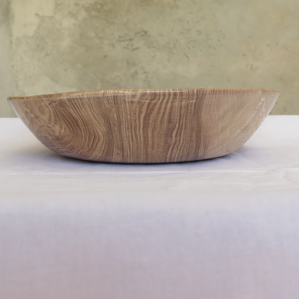 Miniature : "Le tourne pas rond"Assiette décalée en frêne-olivier