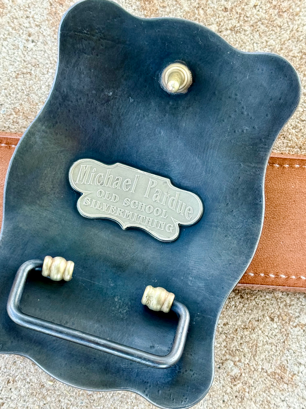 Thumbnail: Michael Pardue Old School Silversmithing buckle on leather belt, detail shot.