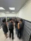 Group of us examining mailboxes, one person pointing
