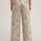 Miniaturbild: VISKOSE-LEINENMIX-PRINT-PALAZZO-HOSE IN BEIGE-SCHWARZ GEMUSTERT