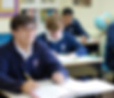 LME Kid in Class Taking Notes_edited.jp