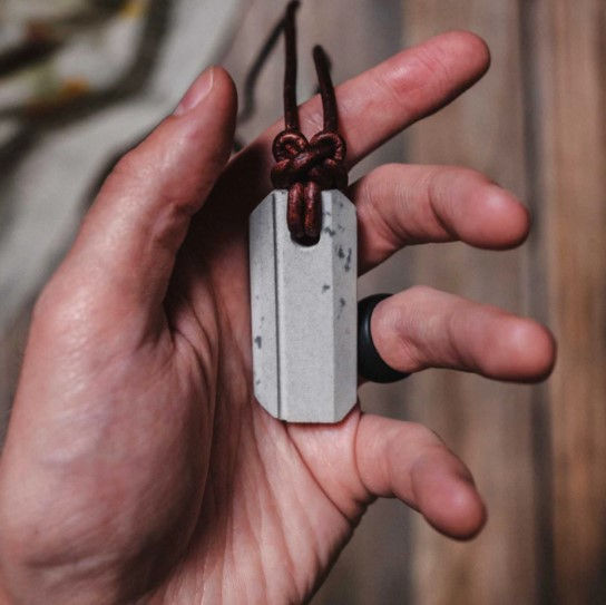 Thumbnail: wazoo survival gear Viking whetstone pendant in hand