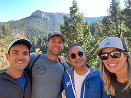 Adam and friends pose on the mountain during a hike in Colorado Springs.