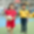 Thumbnail: Two young students in colorful sports uniforms on a playground; girl in red holding a soccer ball.