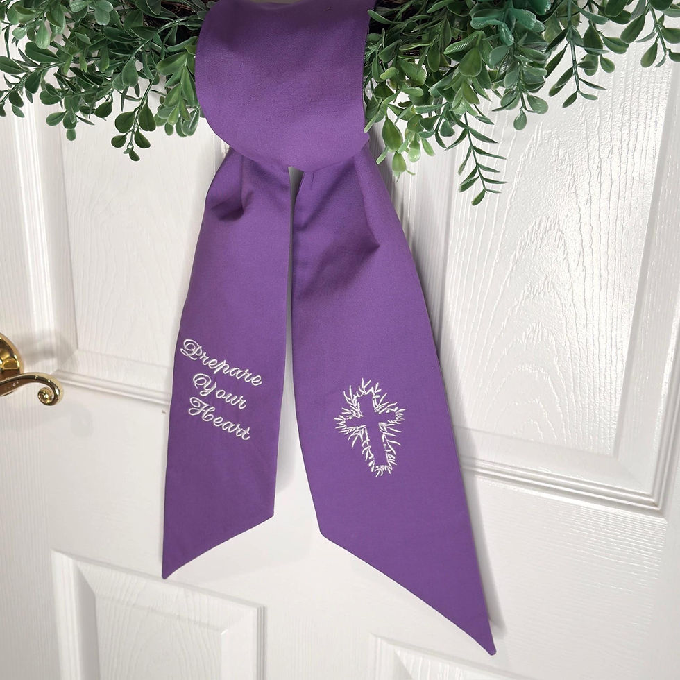 Thumbnail: Purple wreath sash with embroidered cross and Prepare Your Heart text tied in a simple knot on a green boxwood wreath