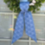 Tilda Something Blue Denim wreath sash deep denim powder blue tonal floral cotton tied on eucalyptus wreath white door