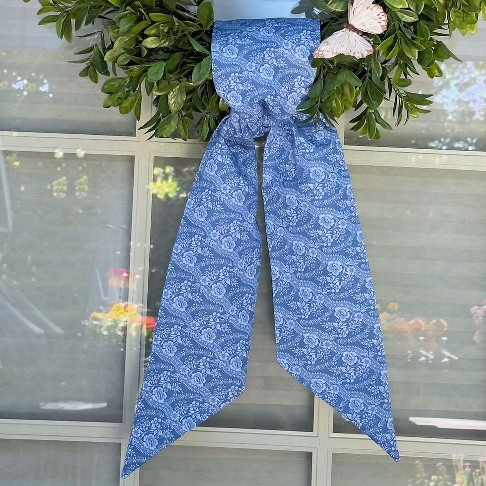 Thumbnail: Tilda Something Blue Denim wreath sash deep denim powder blue tonal floral cotton tied on eucalyptus wreath white door