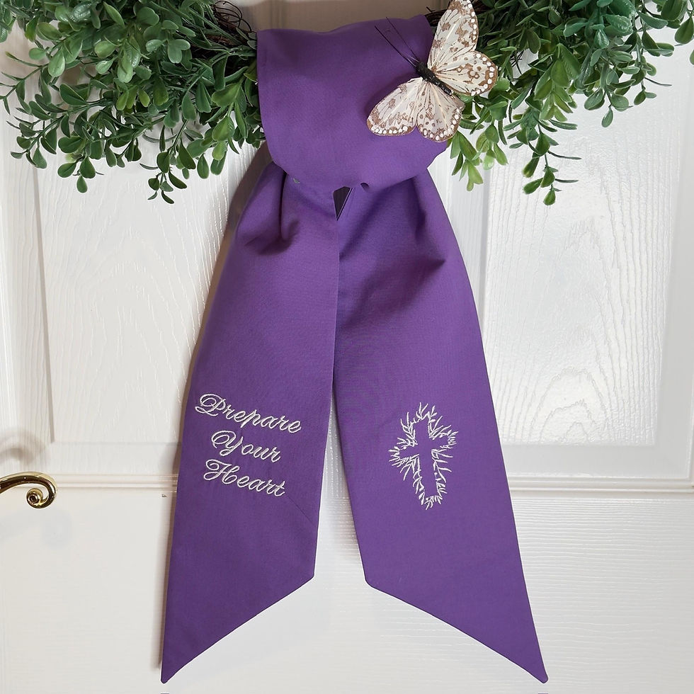 Thumbnail: Purple wreath sash with embroidered cross and Prepare Your Heart text tied in a simple knot on a green boxwood wreath