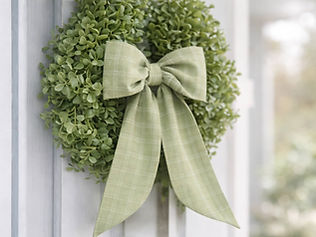 Fresh-Landing handmade wreath bow on a boxwood wreath.jpg