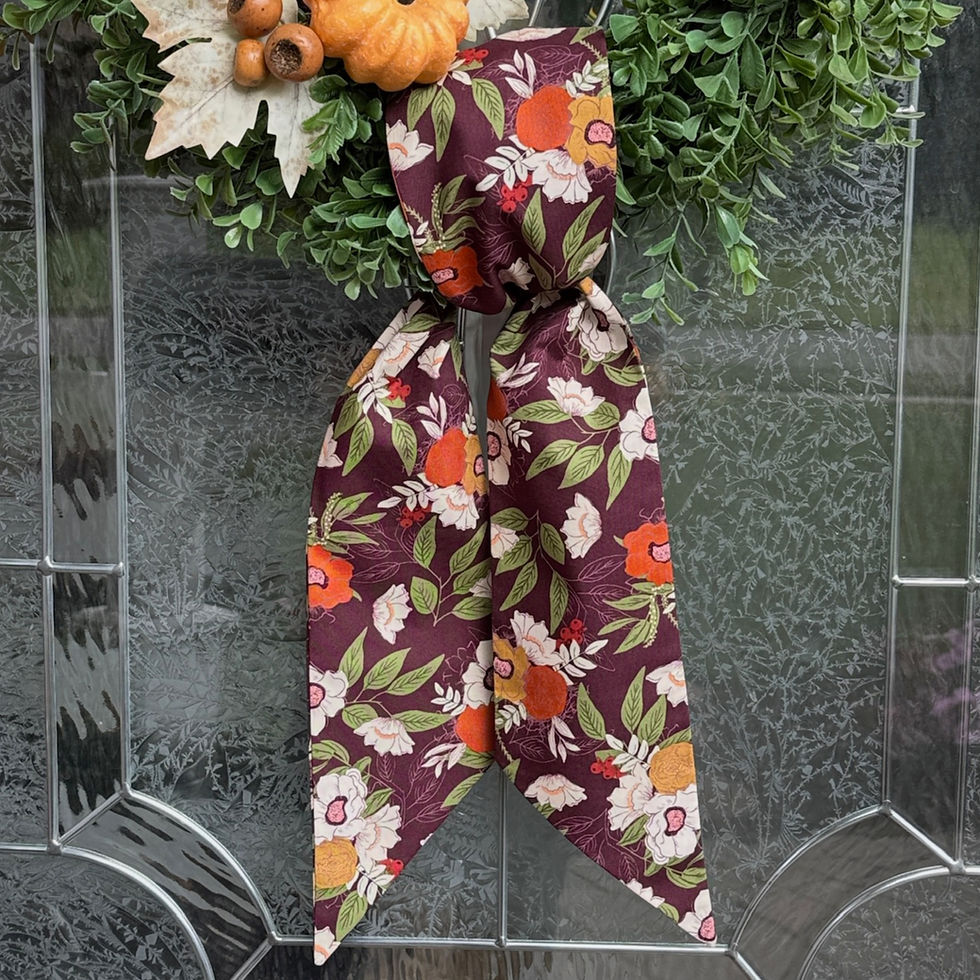 Thumbnail: burgundy and plum floral simple knot wreath sash tied to a boxwood wreath for front door porch decor