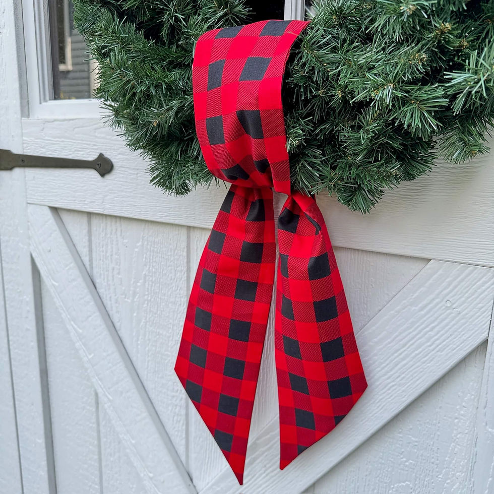 Thumbnail: Holiday red and black buffalo check wreath sash tied in a simple knot on a green Christmas wreath rustic farmhouse door decor