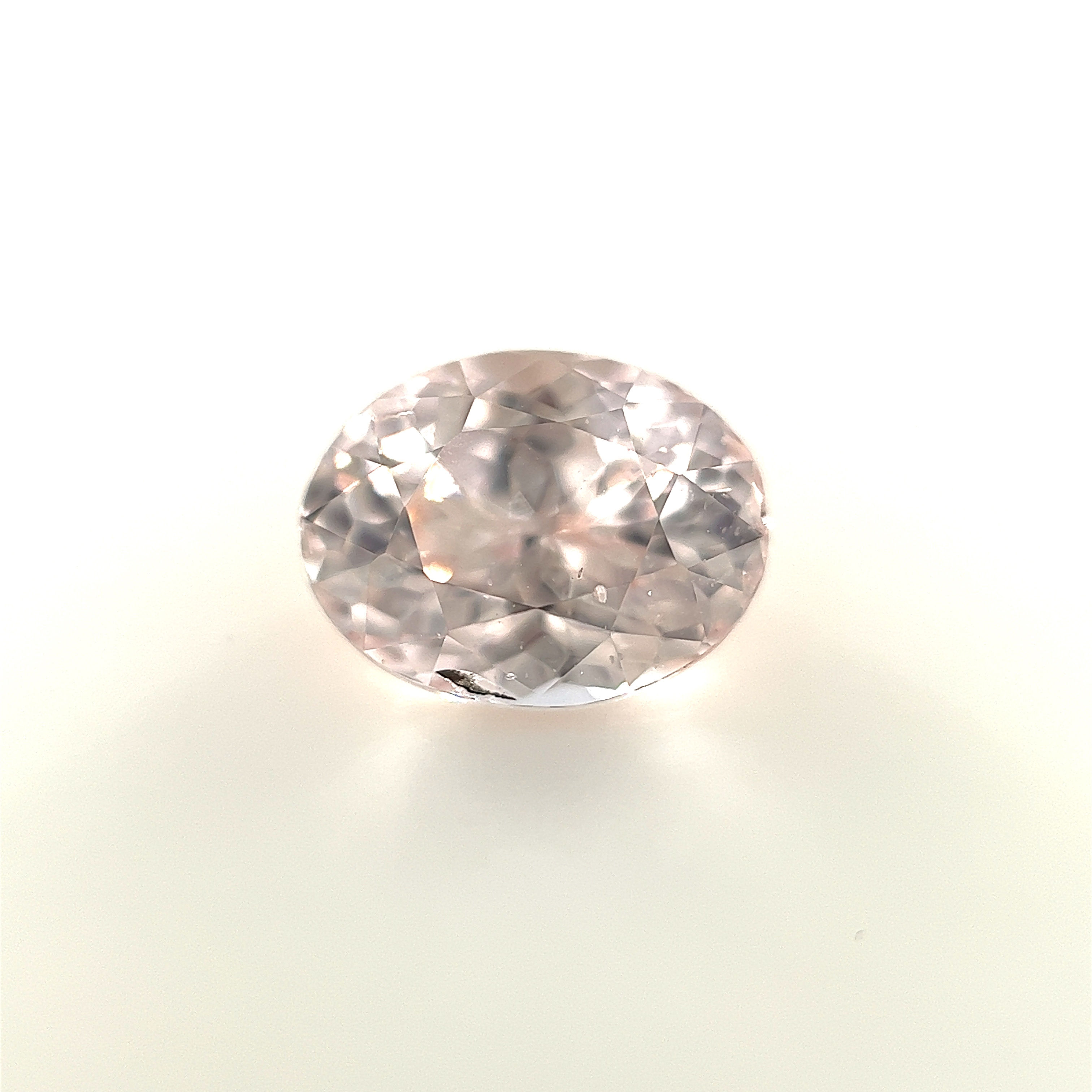 Peach Sapphire 1.30 cts. 7.0 x 5.4mm, oval
