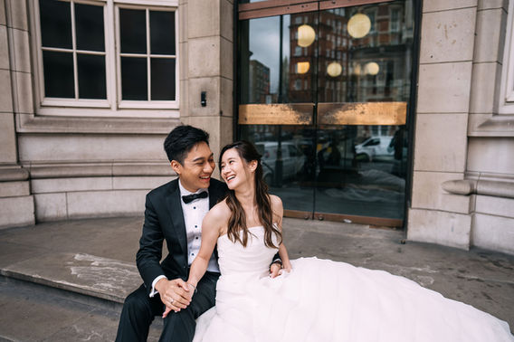 pre wedding photoshoot London Hong Kong couple sitting street romantic candid portrait
