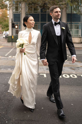 wedding makeup London Asian bride groom walking city street elegant bridal look natural style