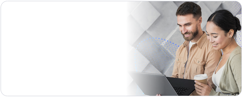 ISUMO team members looking at a laptop in a modern office setting