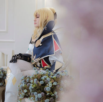 Genshin Impact Cosplay Jean Gunnhildr. Blonde Woman in corset at Alleycat Studio