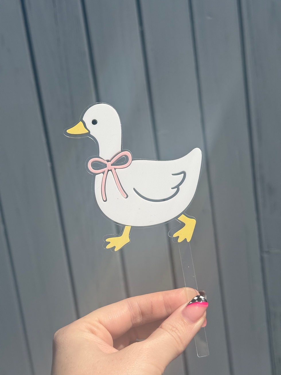 Thumbnail: White duck cutout with pink bow