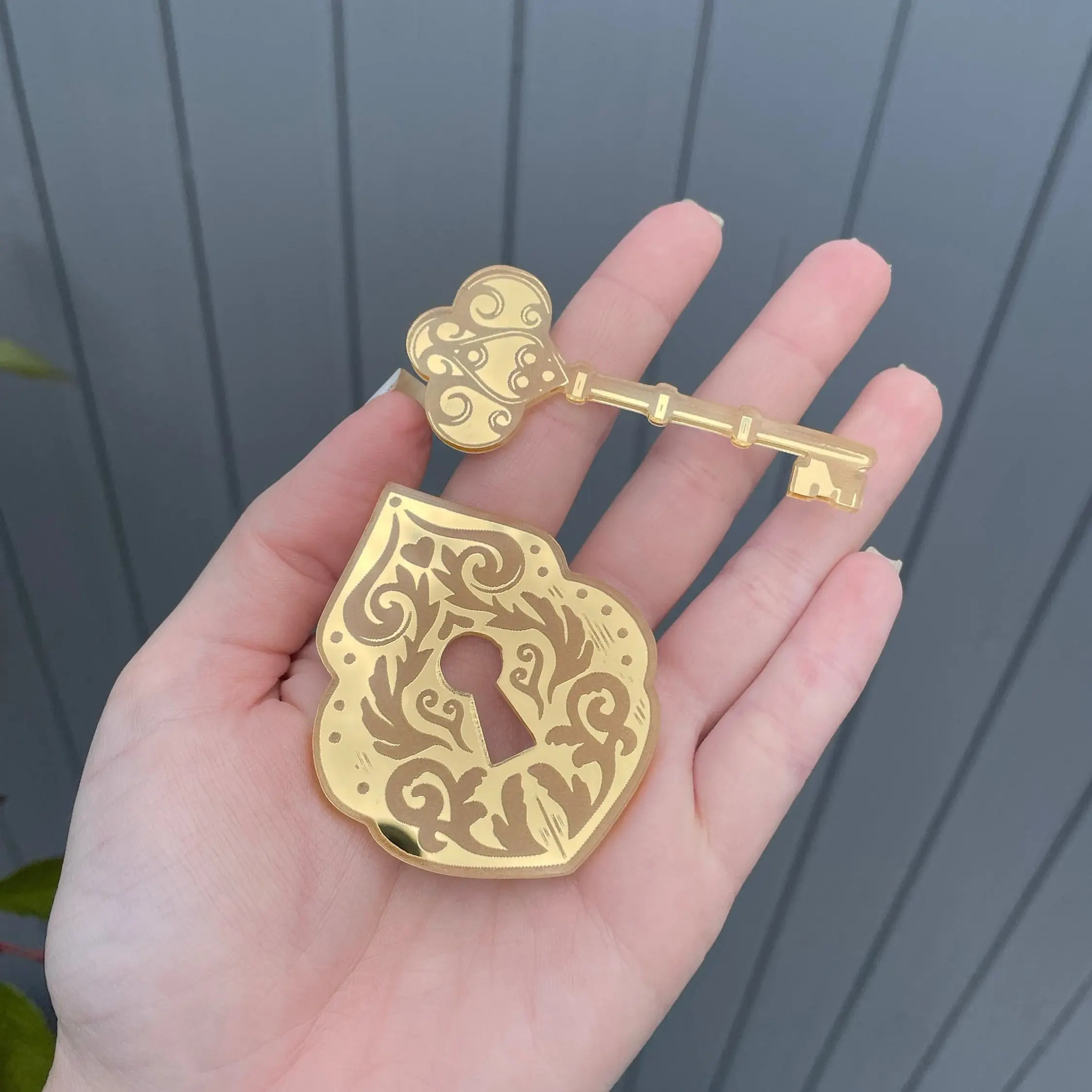 Decorative gold key and keyhole