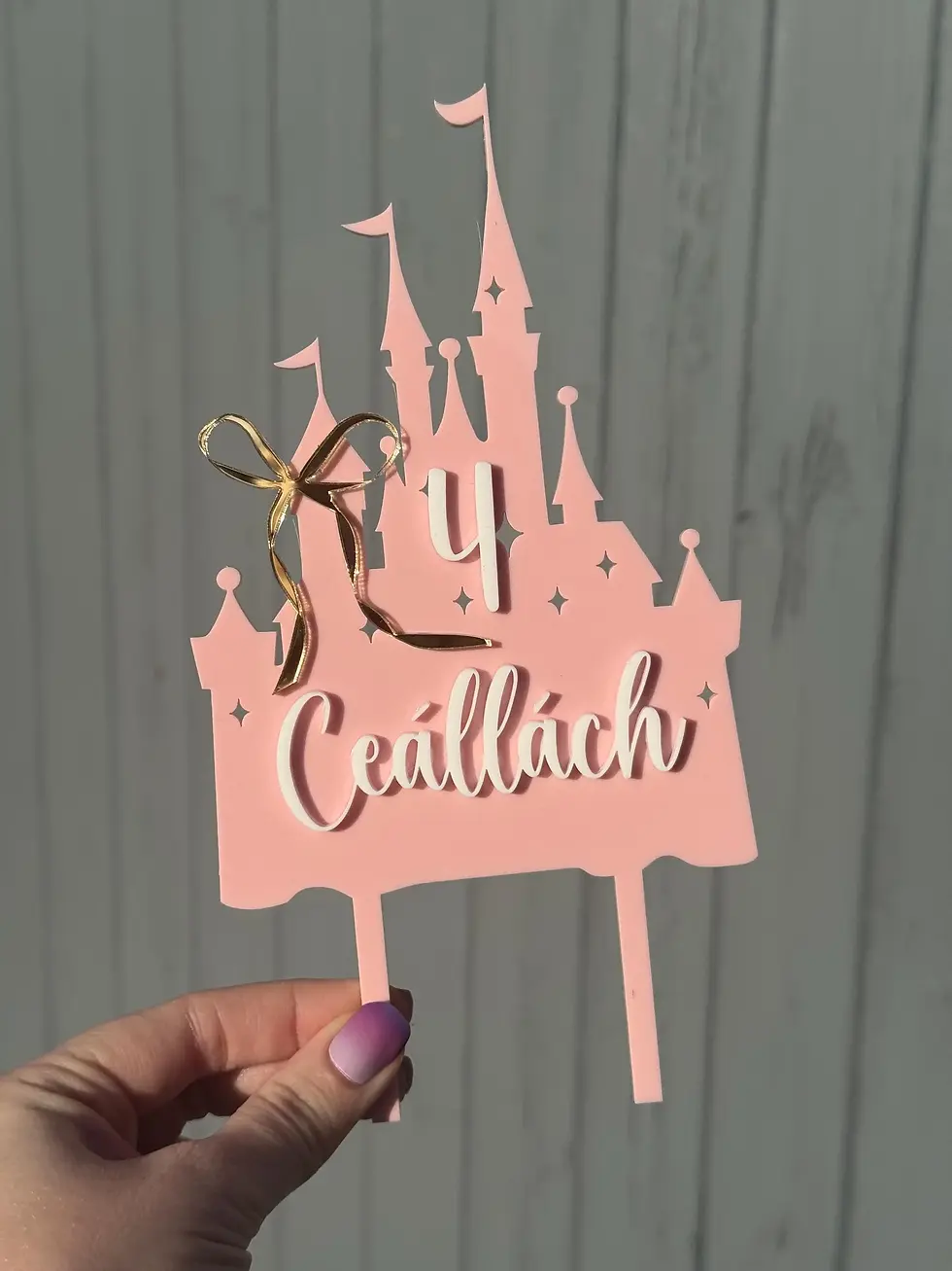 Thumbnail: Pink castle cake topper with '4 Ceallach'