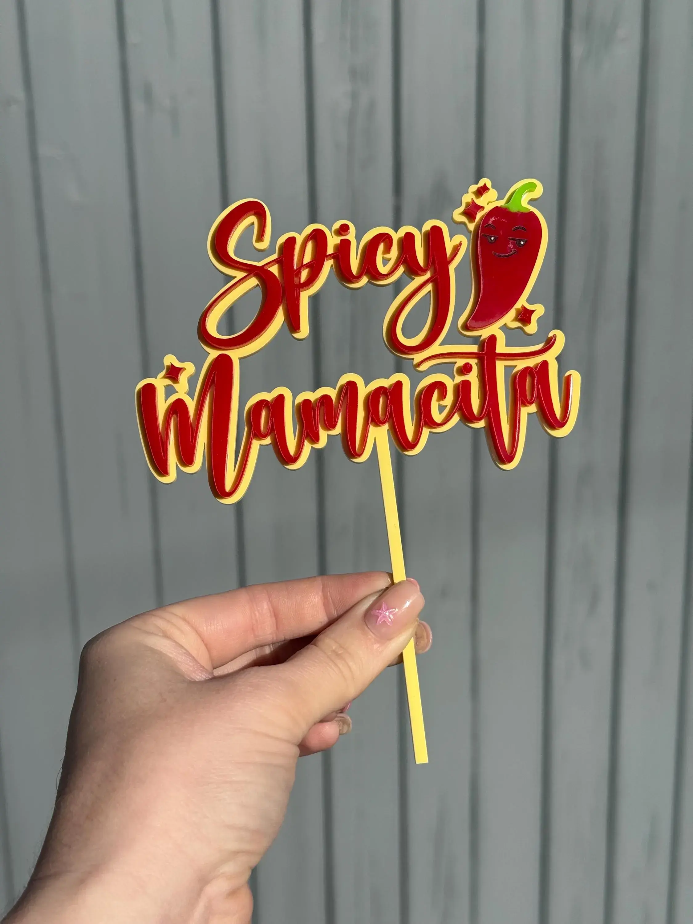 Cake topper with "Spicy Mamacita" and chili pepper