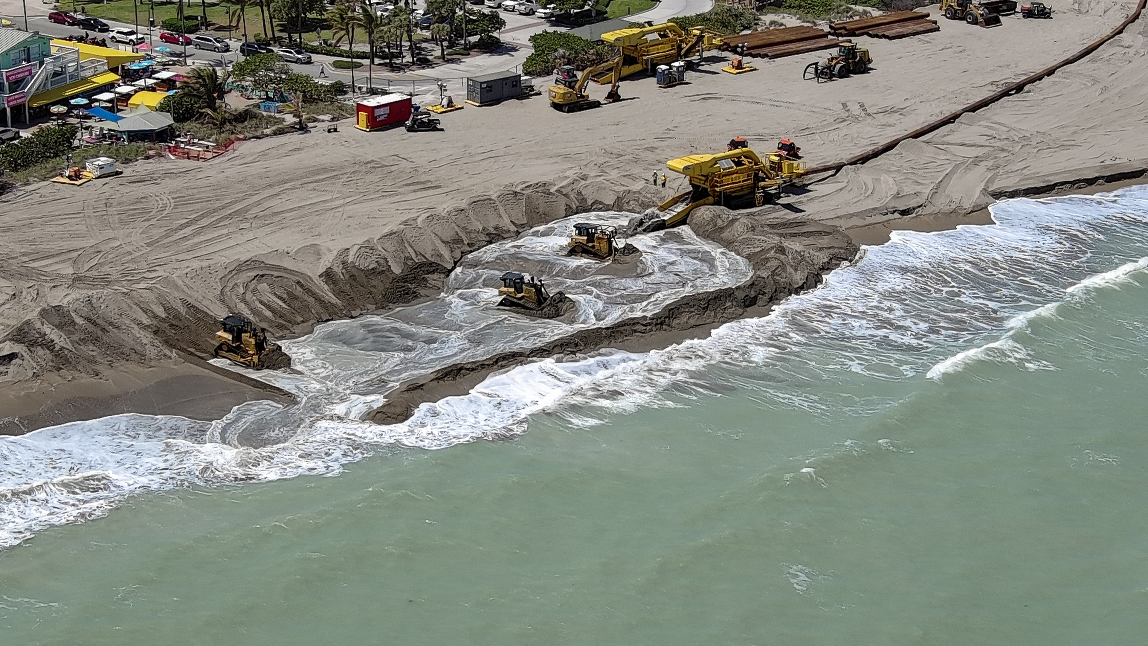 Aerial view of coastal restoration work representing post-storm documentation services